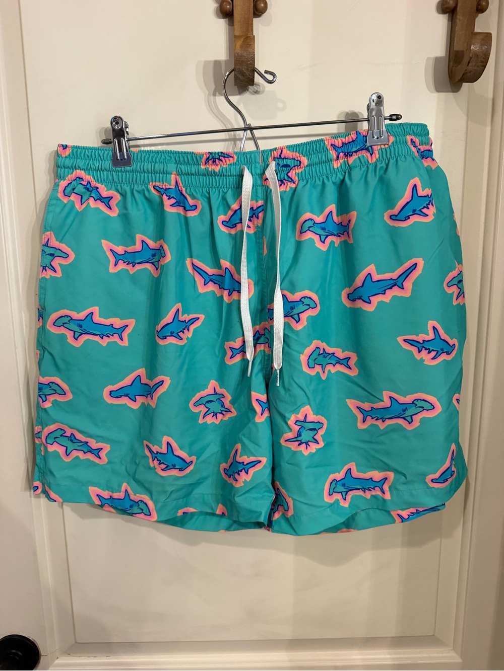 chubbies Teal Swim Trunks with Blue and Pink Shark Print